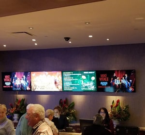 welcome screens at hotel reception desk